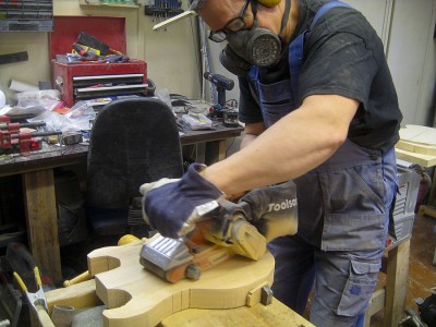 The alder pieces had moved a little during gluing, so I levelled the top and the bottom with a belt sander.