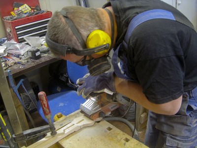 050_Shaping_headstock_with_belt_sander.jpg