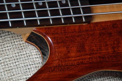 Closeup of the top showing the Bubinga/Maple/Walnut/Maple/Bubinga construction of the wings