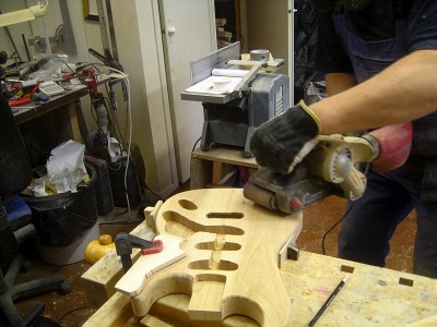 Using a belt sander for shaping the forearm rest...