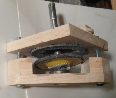 Grain mill griding stones partly assembled.JPG