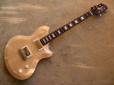 Finished Oceana Duo-Tone in natural finish with a nice flame Maple top.