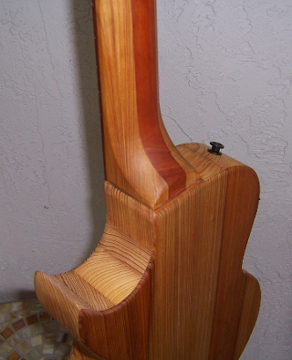 Beautiful set neck joint, showing the 3 piece Cypress and Cherry laminated neck.