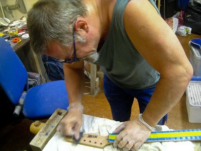 Of course the neck had to be sanded and polished. Wet sanding here...