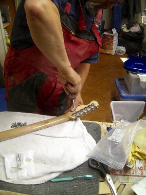 Once the neck was polished, I installed the tuners.