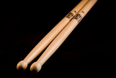 I turned a pair of 5B maple drumsticks just for fun, after noticing I had two 16&quot; pieces of maple just perfect for drumsticks every time I made a Fender type neck. This photo was taken in a cheap mini studio. I purchased a portable mini studio with a small tripod and two daylight temperature halogen spots. It's a 40x40x40 cm white fabric cube with one wall open. It cost 40 € and suitable for photographing small objects, up to the size of drumsticks placed diagonally. A mini studio is easy to build too. All you need is some wood, white fabric, glue, corner clamps and a stapler.