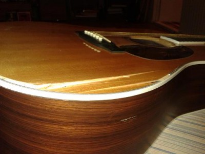 D16 soundboard damage2- note small crack on rosewood side