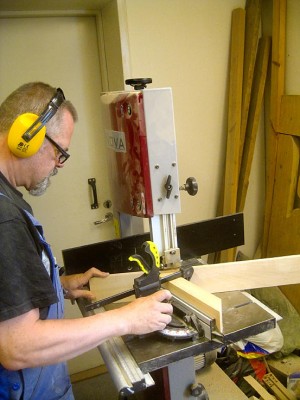 The headstock and the rest of the neck are cut from the same piece of maple and then glued together.