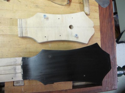 hole template with ebony veneer headstock