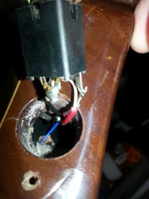 In this pic you can see the ugly solder on the red wire.